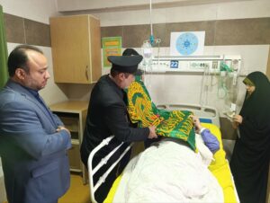 گزارش تصویری/تبرک بیماران بستری در بیمارستان حضرت رسول اکرم(ص) به پرچم حرم مطهر رضوی