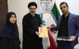 زائر کربلای معلی مدال طلای خود را به موکب شهید میرزا کوچک اهداء کرد